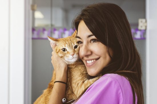 veterinarian-doctor-hugging-a-little-cat-.jpg